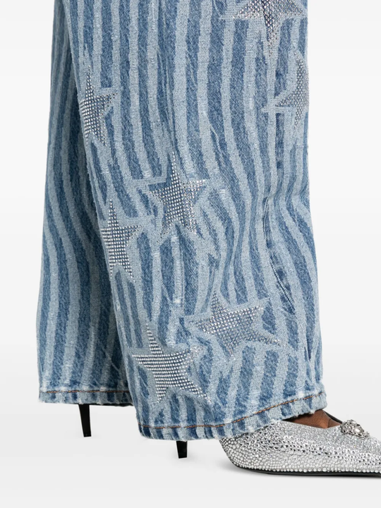 Close up of blue pants, showing texture of the cotton fabric