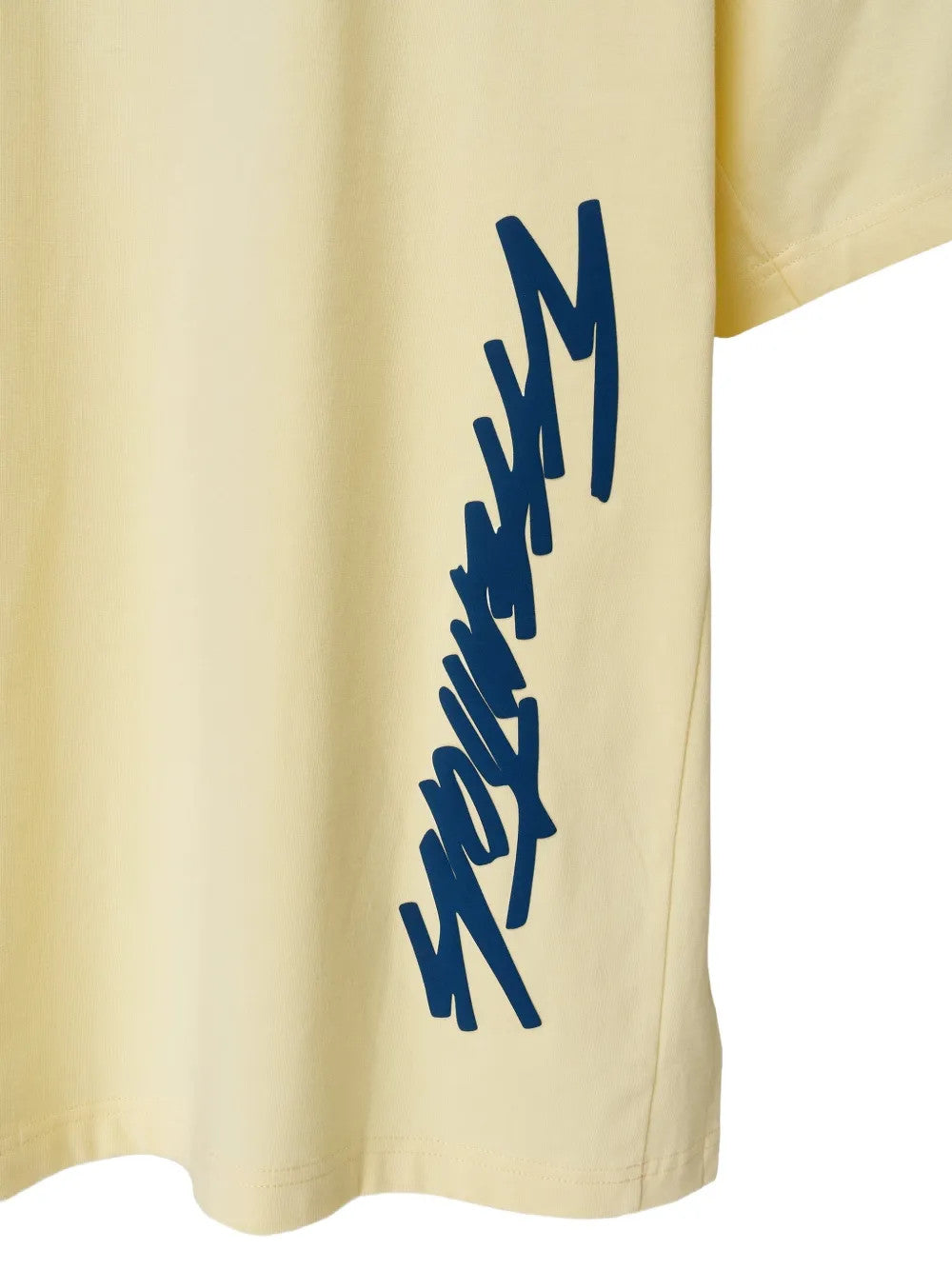 Close up of Yellow t-shirt, showing texture of the 100% cotton fabric