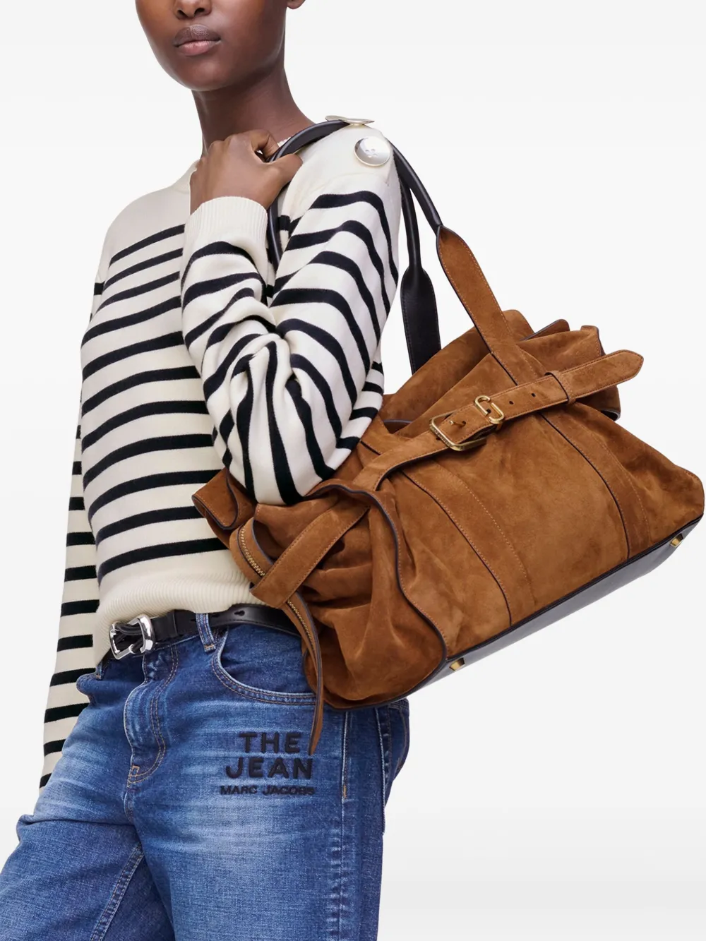 Brown bag worn by a person, showing the bag's fit