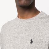 Close up of grey shirt, showing texture of the cotton fabric