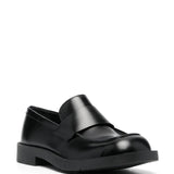 Black loafers, side view