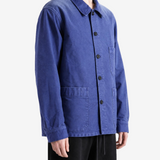 Blue jacket worn by a person, showing the jacket fit