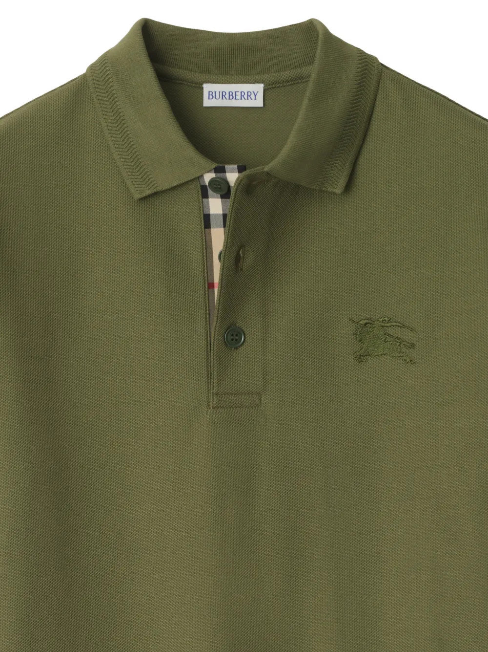 Close up of Green top, showing texture of the 100% cotton fabric
