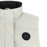 Close up of White jacket, showing texture of the 84% polyester/ 16% cotton fabric