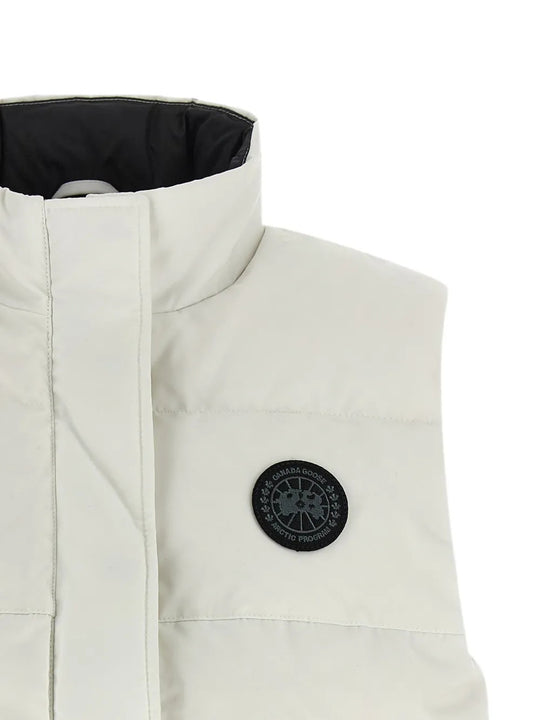 Close up of White jacket, showing texture of the 84% polyester/ 16% cotton fabric