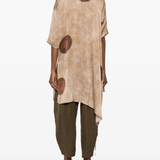 Brown top worn by a person, showing the top's fit