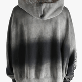 Gray hoodie worn by a person, showing the hoodie fit