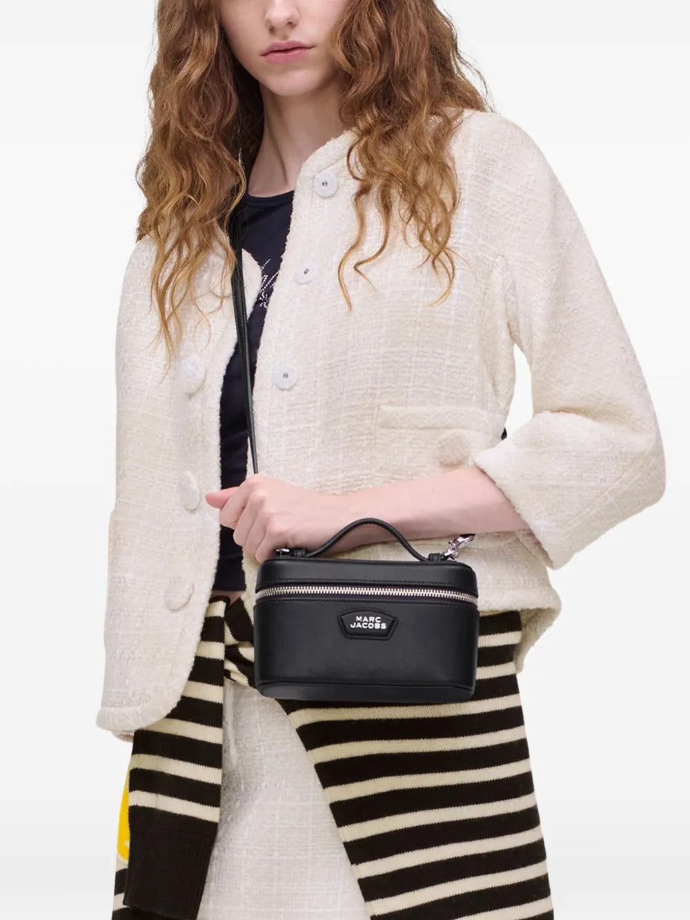 Black bags worn by a person, showing the bags fit