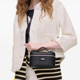 Black bags worn by a person, showing the bags fit