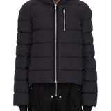 Black jacket worn by a person, showing the jacket's fit