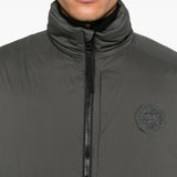 Grey jacket worn by a person, showing the jacket fit