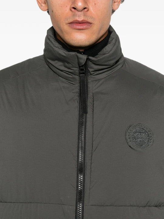 Grey jacket worn by a person, showing the jacket fit