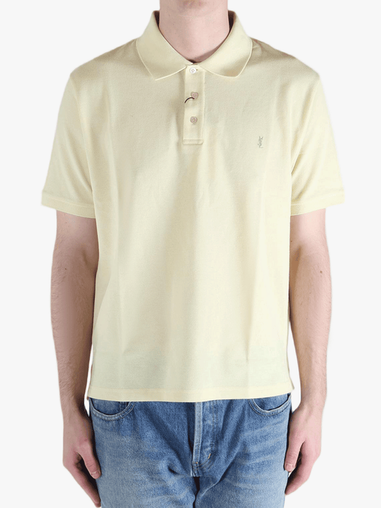 Tan shirt worn by a person, showing the fit