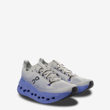 Grey sneakers, side view