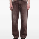 Brown pants worn by a person, showing the pants fit