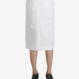 White skirt worn by a person, showing the skirt fit