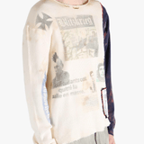 White knitwear worn by a person, showing the knitwear fit