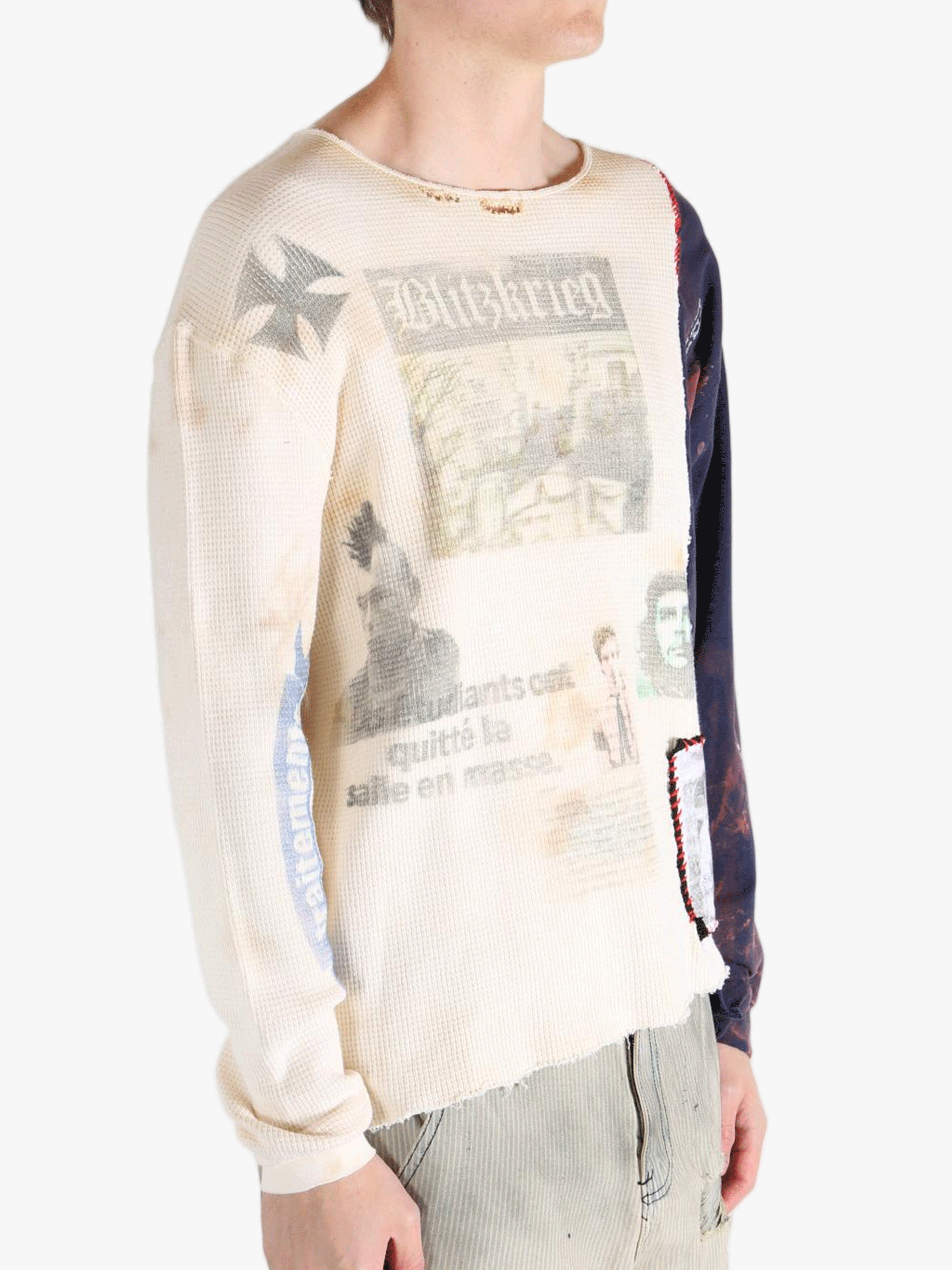 White knitwear worn by a person, showing the knitwear fit