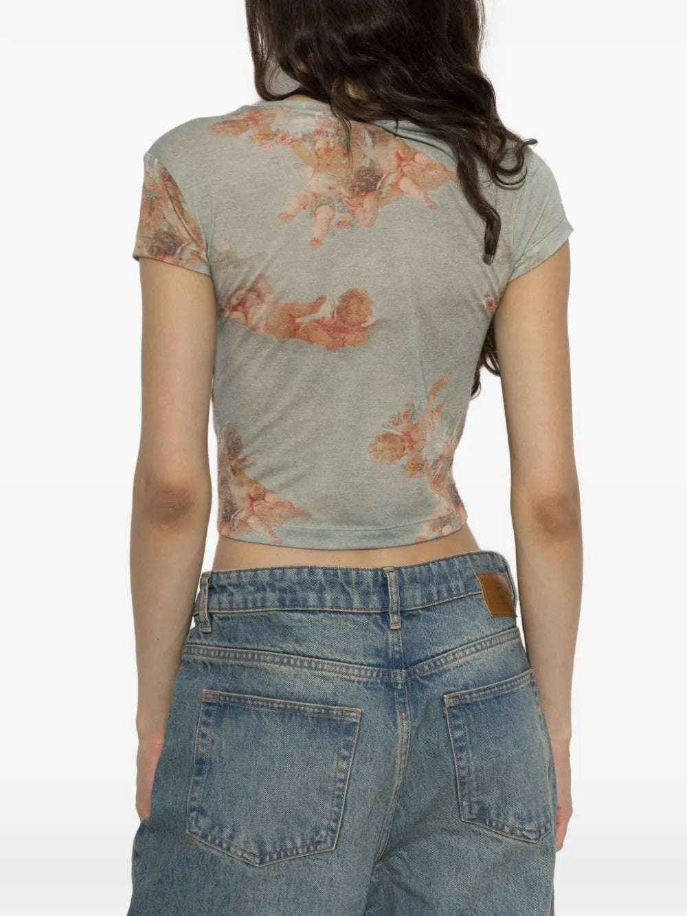 Grey t-shirt worn by a person, showing the t-shirt fit