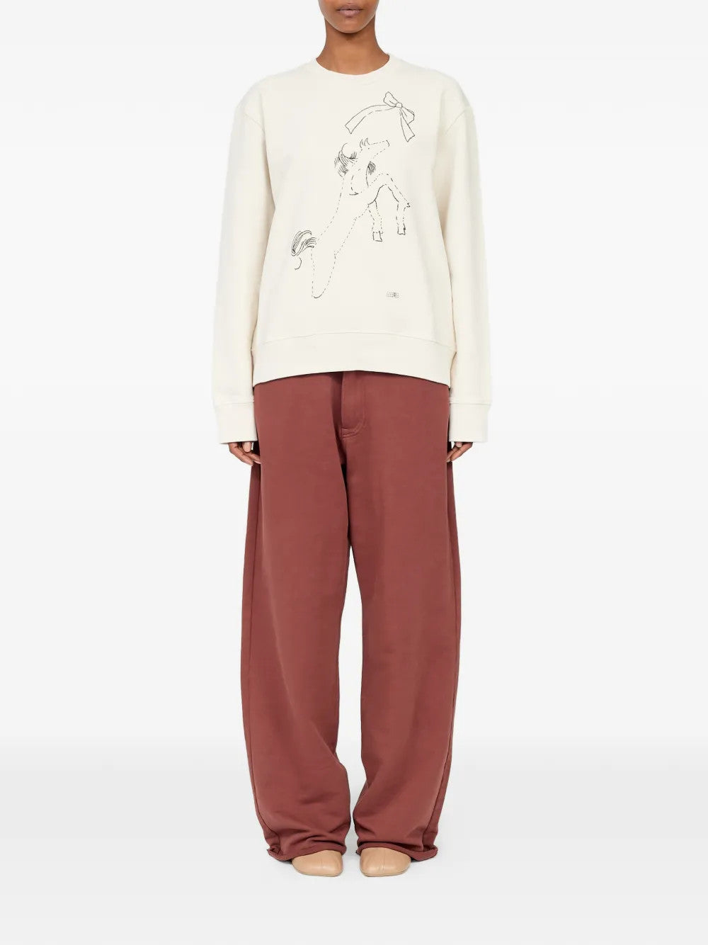 Tan knitwear, full body view