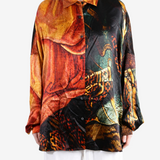 Orange shirt worn by a person, showing the shirt fit