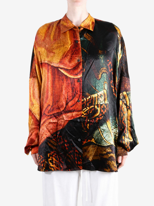 Orange shirt worn by a person, showing the shirt fit