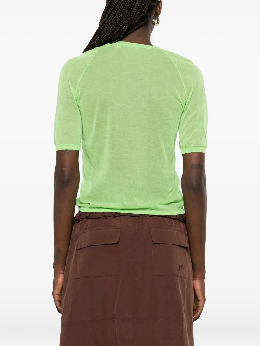 Green top, full body view