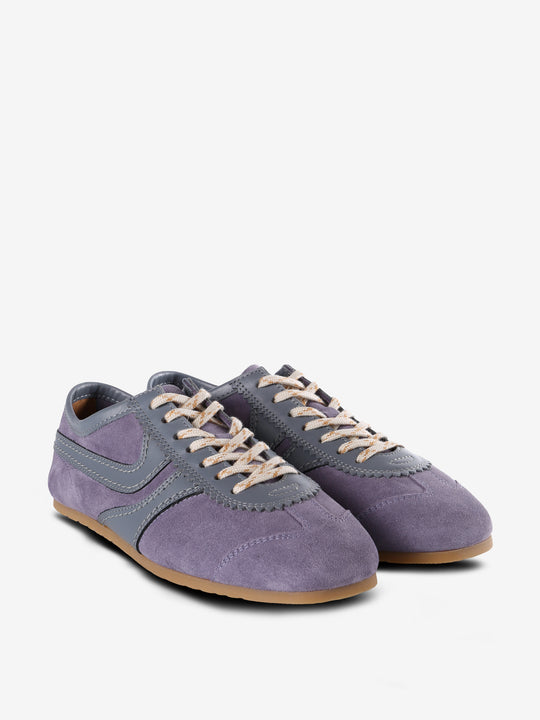 Purple sneakers, side view