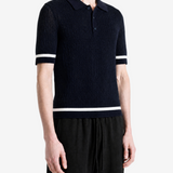 Navy top worn by a person, showing the top fit