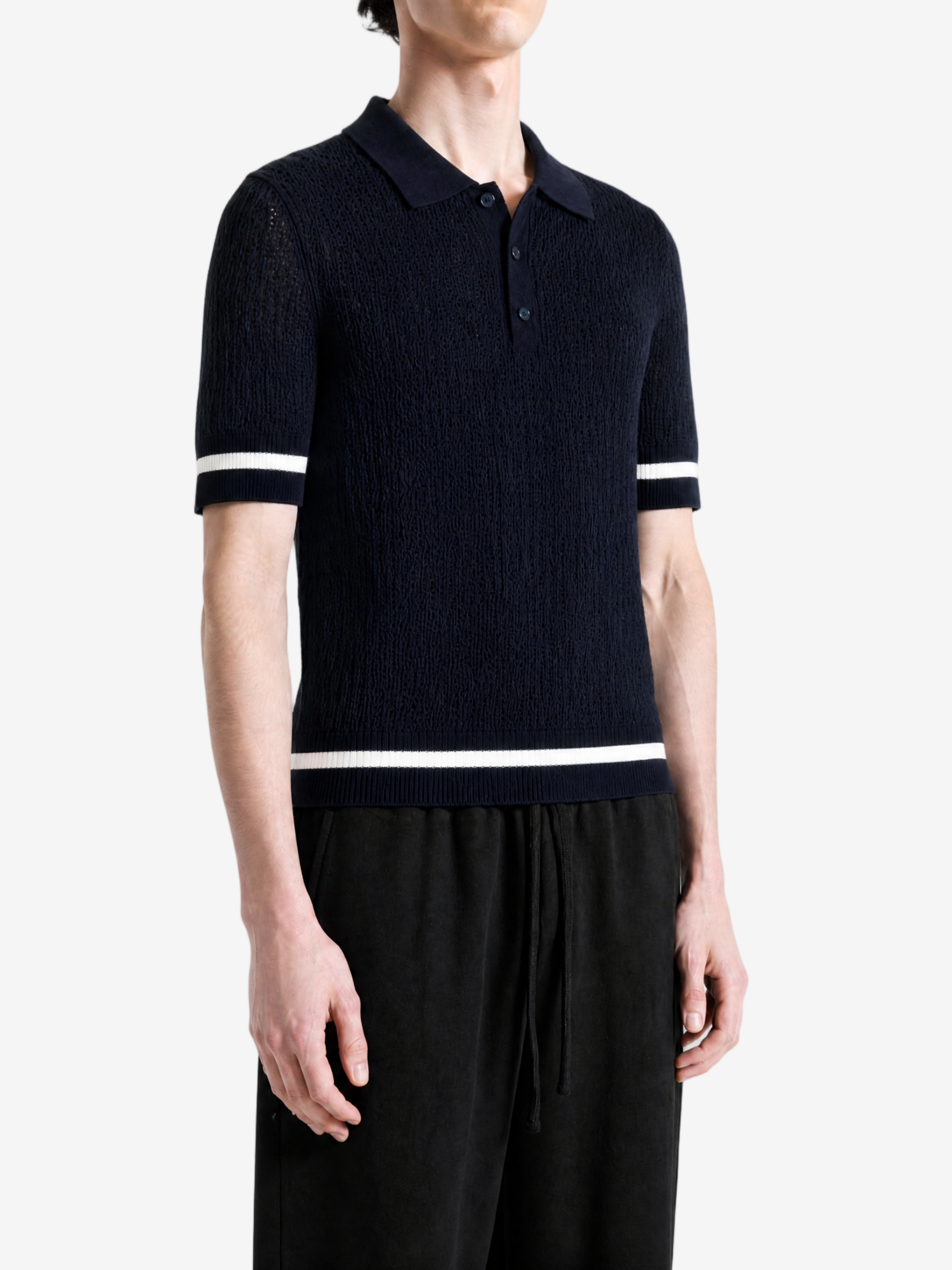 Navy top worn by a person, showing the top fit