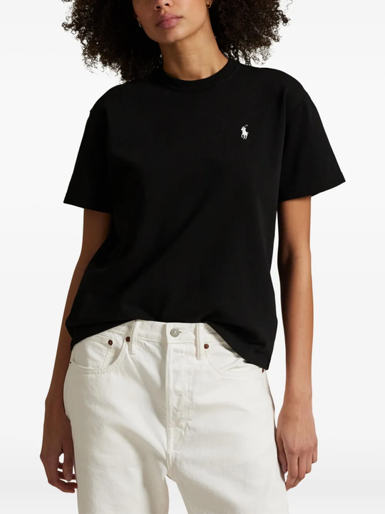 Black t-shirt worn by a person, showing the t-shirt fit