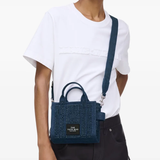 Blue bag worn by a person, showing the bag's fit