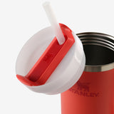 Close up of the red tumbler, showing texture of the stainless steel fabric