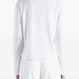 White top, full body view