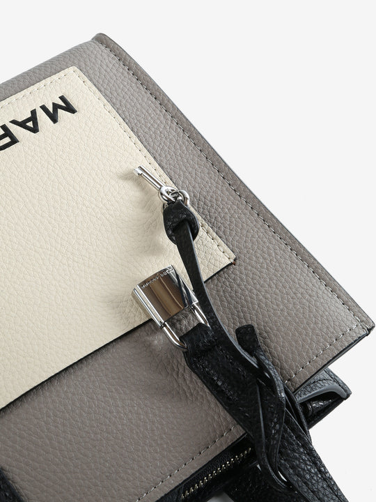 Close up of grey bag, showing texture of the leather fabric