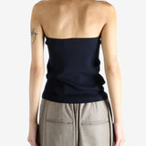 Navy top worn by a person, showing the top's fit