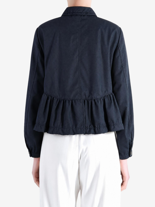 Navy jacket worn by a person, showing the jacket fit