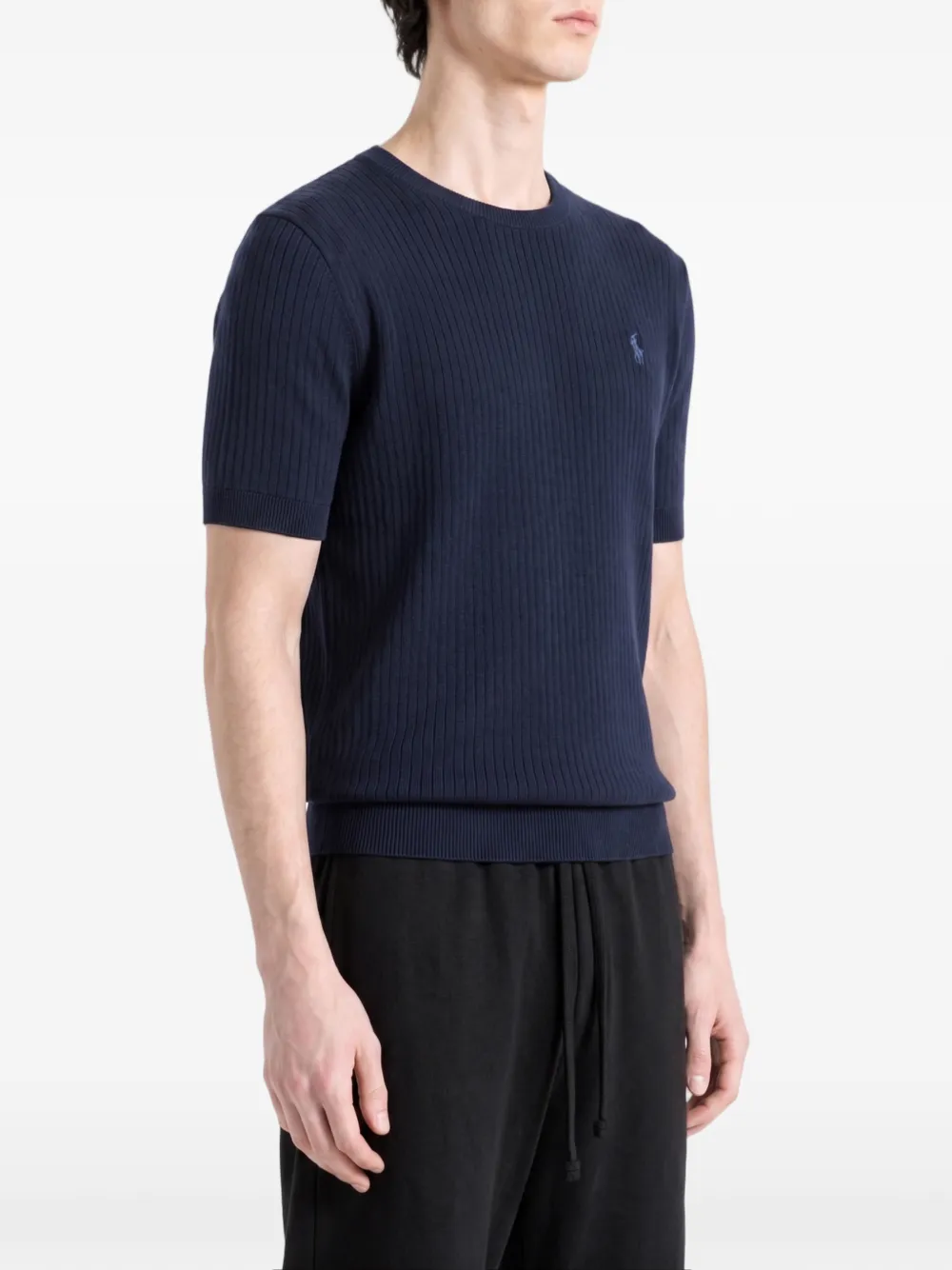 Blue hoodie worn by a person, showing the hoodie fit
