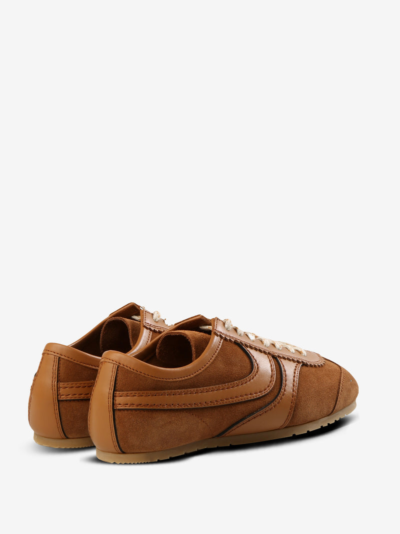 Tan sneakers, back view