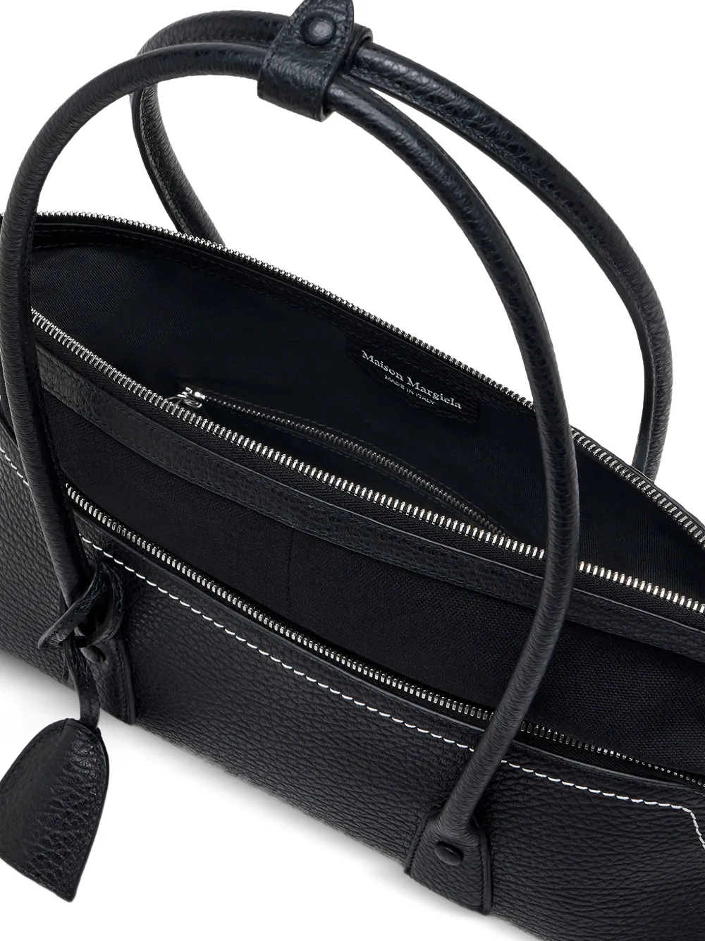 Close up of black bag, showing texture of the Calf Leather fabric