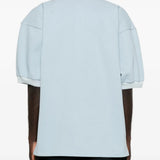 Blue top, full body view