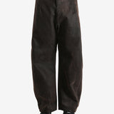 Brown pants worn by a person, showing the pants fit