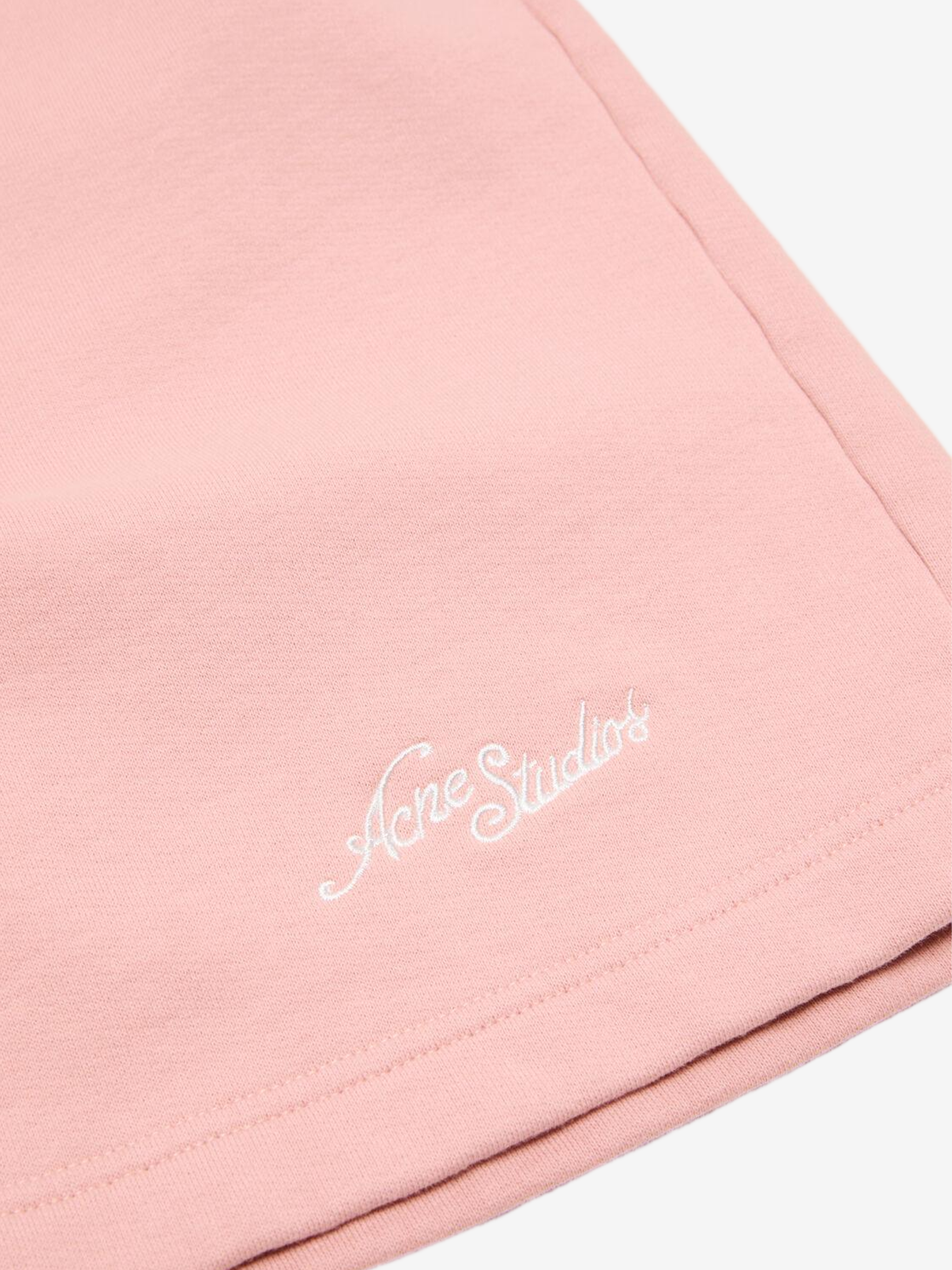 Close up of Pink shorts, showing texture of the 100% cotton fabric
