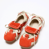 Orange shoes, front view