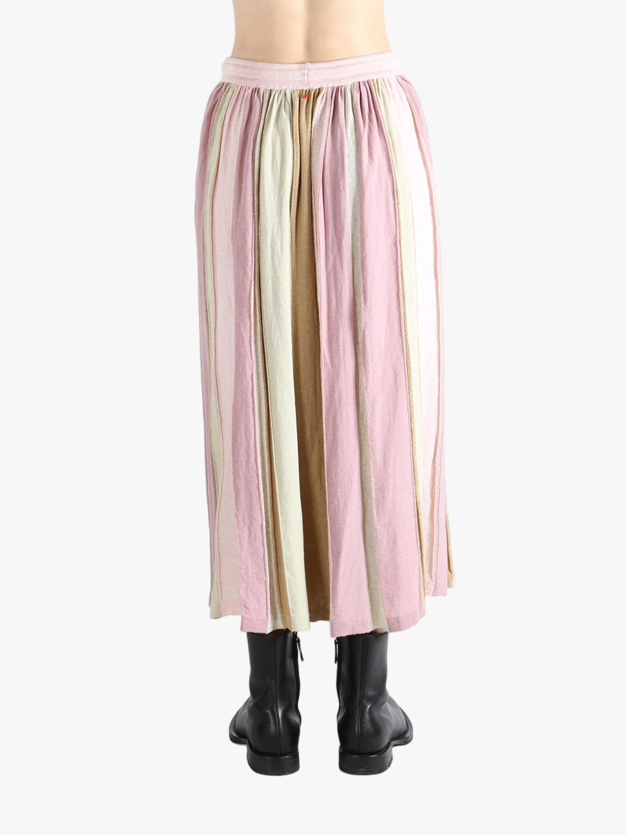 Pink skirt worn by a person, showing the skirt fit