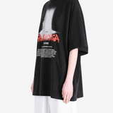 Black t-shirt worn by a person, showing the t-shirt fit