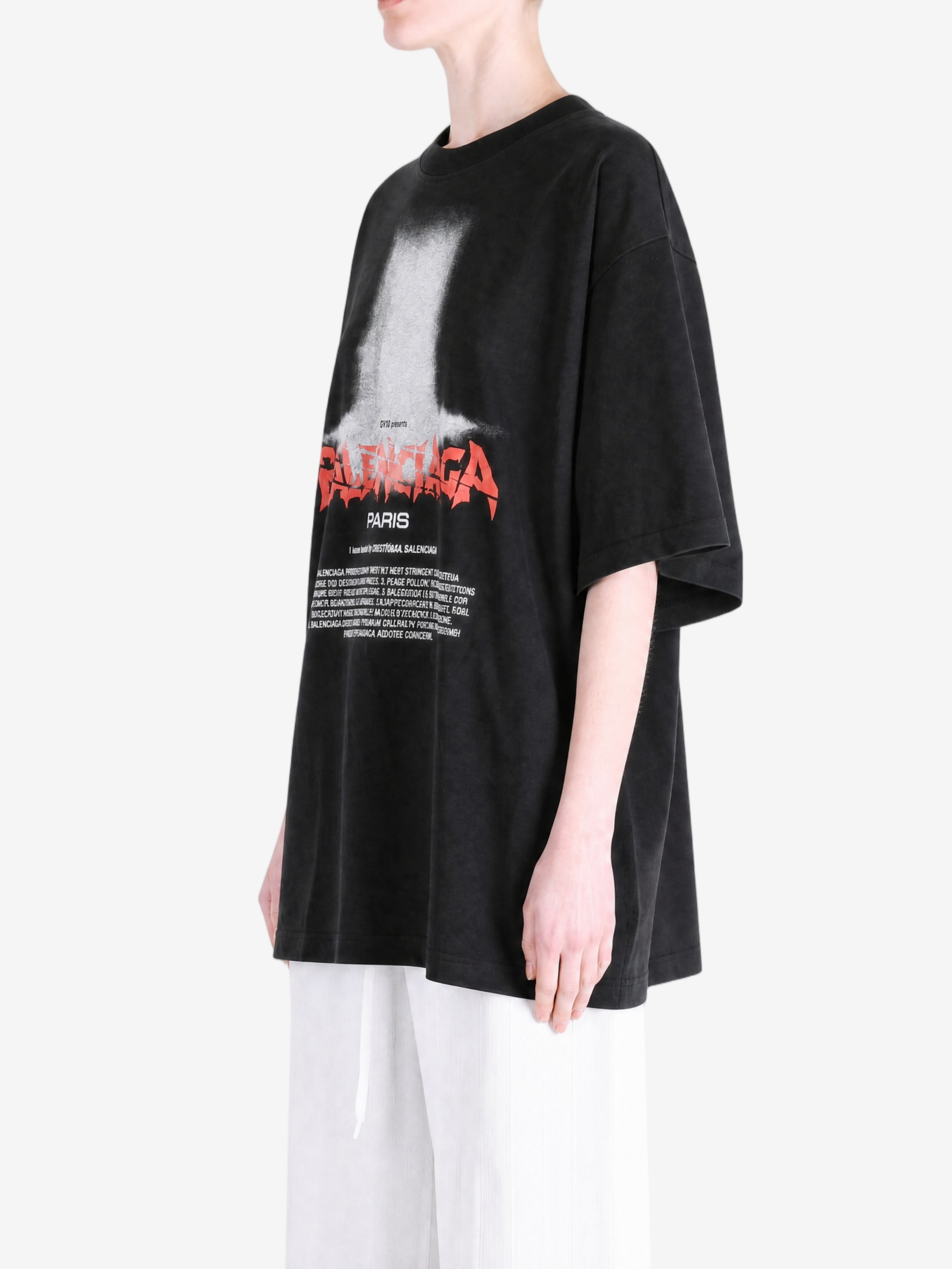 Black t-shirt worn by a person, showing the t-shirt fit