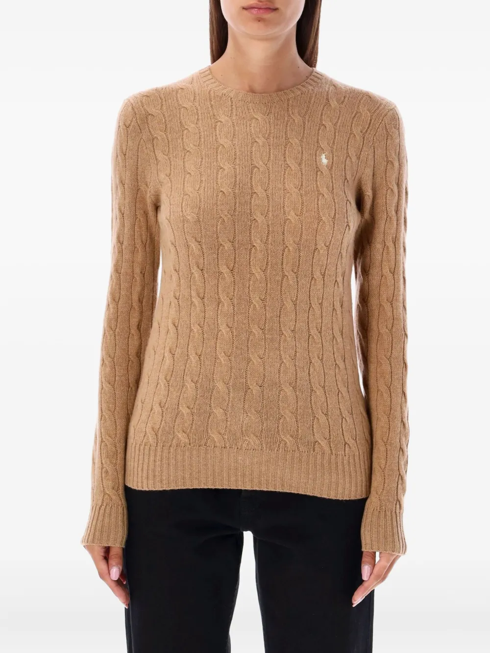 Brown knitwear worn by a person, showing the knitwear's fit