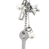 Close up of small accessories, showing texture of the zinc alloy fabric