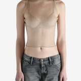 beige ribbed tank top worn by a person, showing the top fit